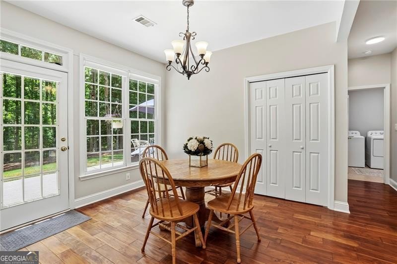 Welcome home to 6930 Olde Atlanta Parkway, where refined living - photo 19