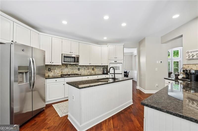 Welcome home to 6930 Olde Atlanta Parkway, where refined living - photo 21
