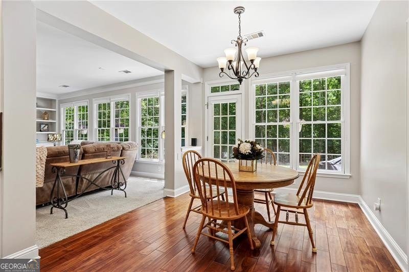 Welcome home to 6930 Olde Atlanta Parkway, where refined living - photo 24