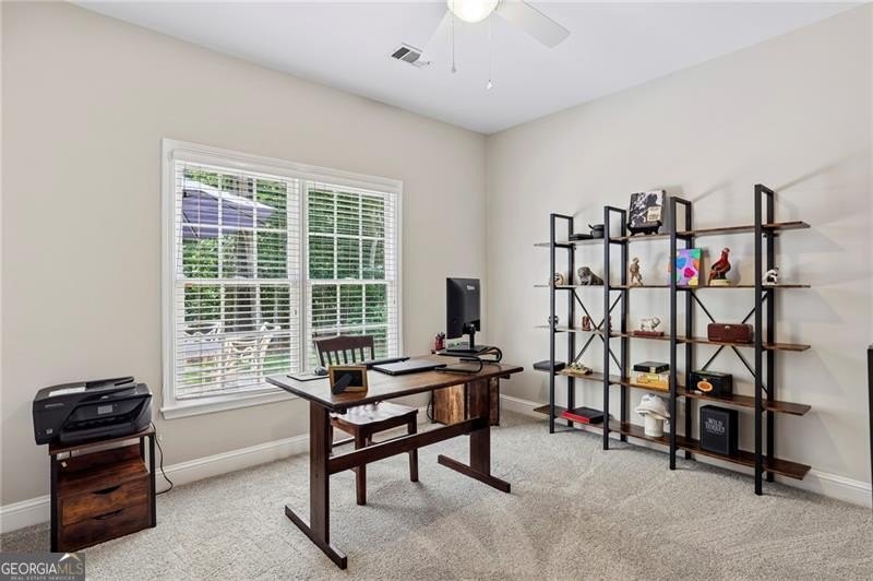 Welcome home to 6930 Olde Atlanta Parkway, where refined living - photo 25