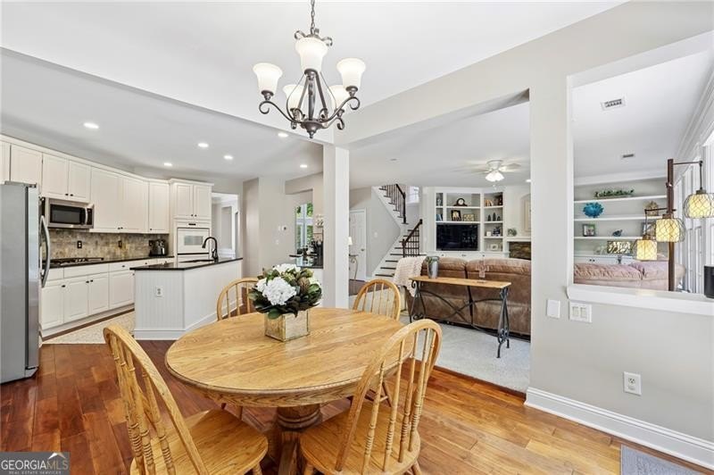 Welcome home to 6930 Olde Atlanta Parkway, where refined living - photo 28