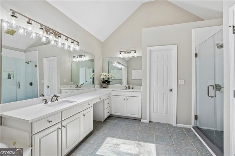 Welcome home to 6930 Olde Atlanta Parkway, where refined living - photo 32