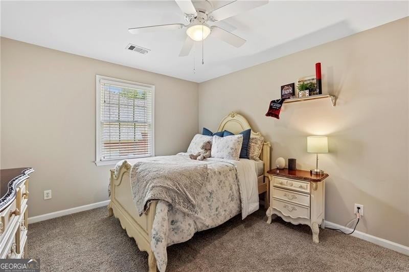 Welcome home to 6930 Olde Atlanta Parkway, where refined living - photo 35