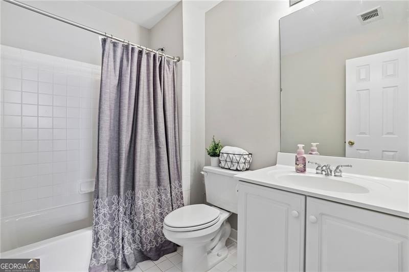Welcome home to 6930 Olde Atlanta Parkway, where refined living - photo 36