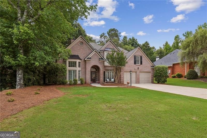 Welcome home to 6930 Olde Atlanta Parkway, where refined living - photo 40