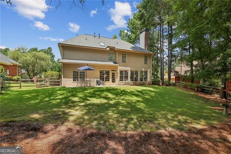 Welcome home to 6930 Olde Atlanta Parkway, where refined living - photo 41