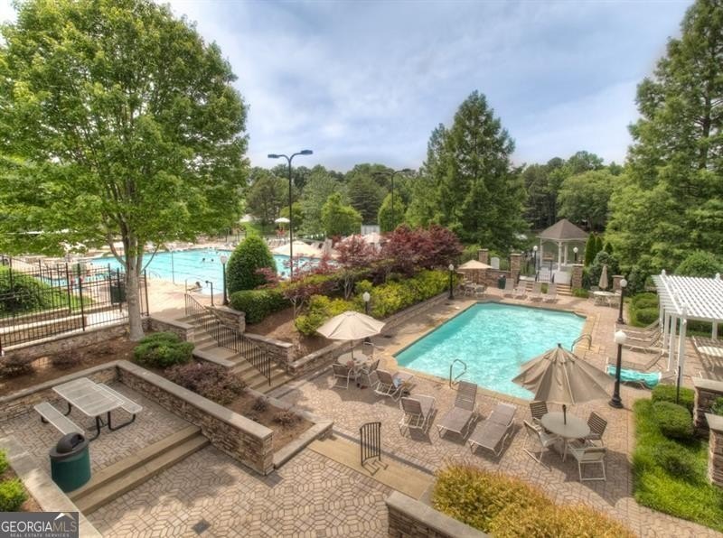 Welcome home to 6930 Olde Atlanta Parkway, where refined living - photo 46