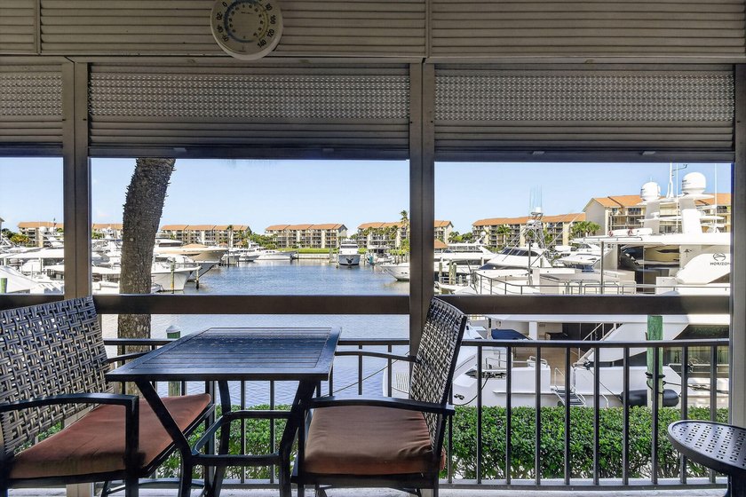 Enjoy spectacular marina views from your living room, kitchen - photo 3