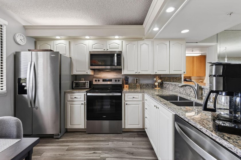 Enjoy spectacular marina views from your living room, kitchen - photo 5