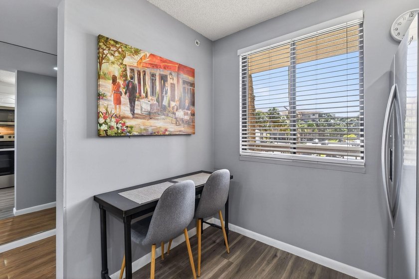 Enjoy spectacular marina views from your living room, kitchen - photo 8