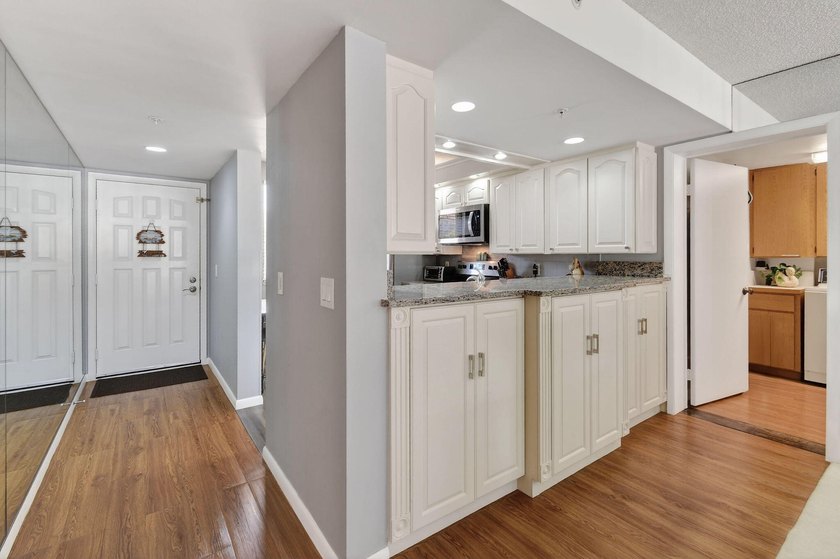 Enjoy spectacular marina views from your living room, kitchen - photo 9