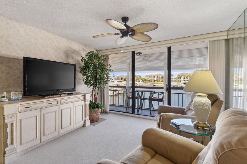Enjoy spectacular marina views from your living room, kitchen - photo 10