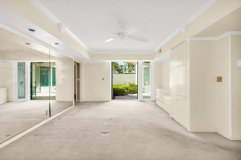 Best Waterfront Value in Mizner Village! Discover one of the - photo 12
