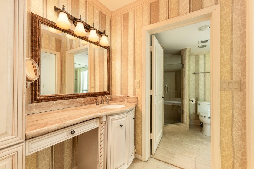 Best Waterfront Value in Mizner Village! Discover one of the - photo 14