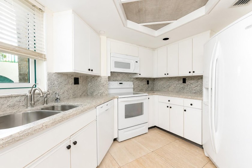 Best Waterfront Value in Mizner Village! Discover one of the - photo 18