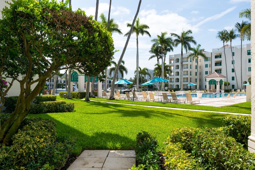 Best Waterfront Value in Mizner Village! Discover one of the - photo 46