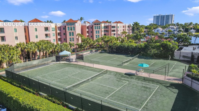 Best Waterfront Value in Mizner Village! Discover one of the - photo 48