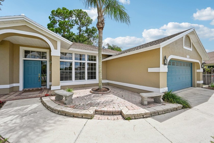 Tucked away in a private setting, this charming 3-bedroom - photo 3