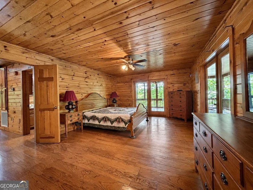 Tucked into a private wooded setting on top of the mountain in - photo 13
