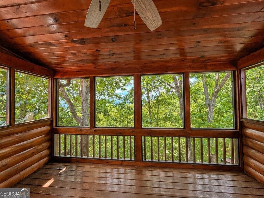 Tucked into a private wooded setting on top of the mountain in - photo 14