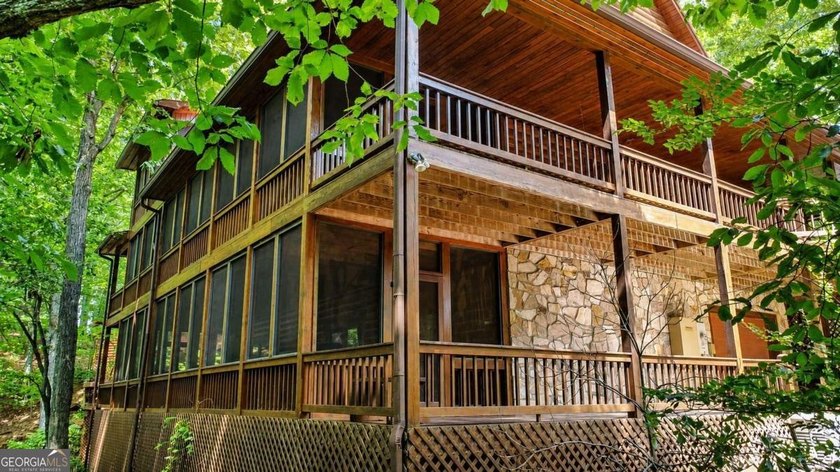 Tucked into a private wooded setting on top of the mountain in - photo 20