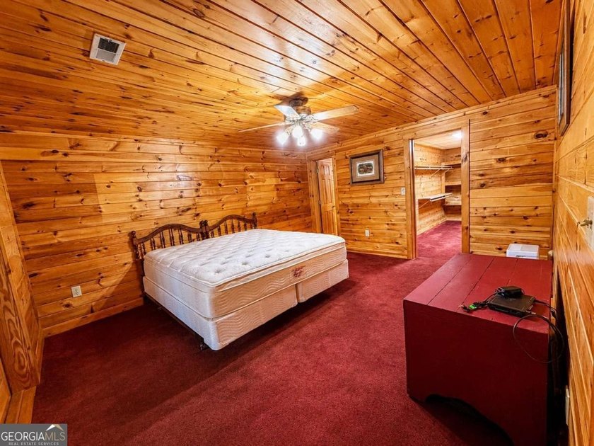 Tucked into a private wooded setting on top of the mountain in - photo 23