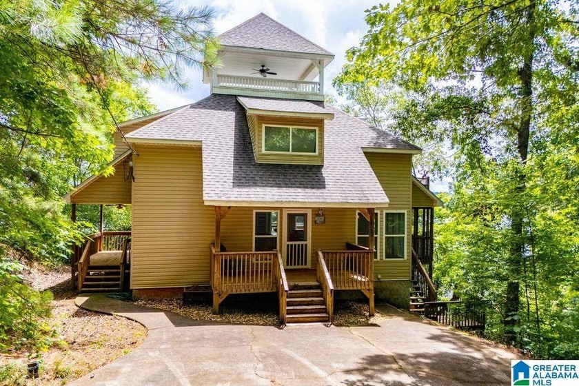 This is a great lake home with a roof top deck the has awesome - photo 2