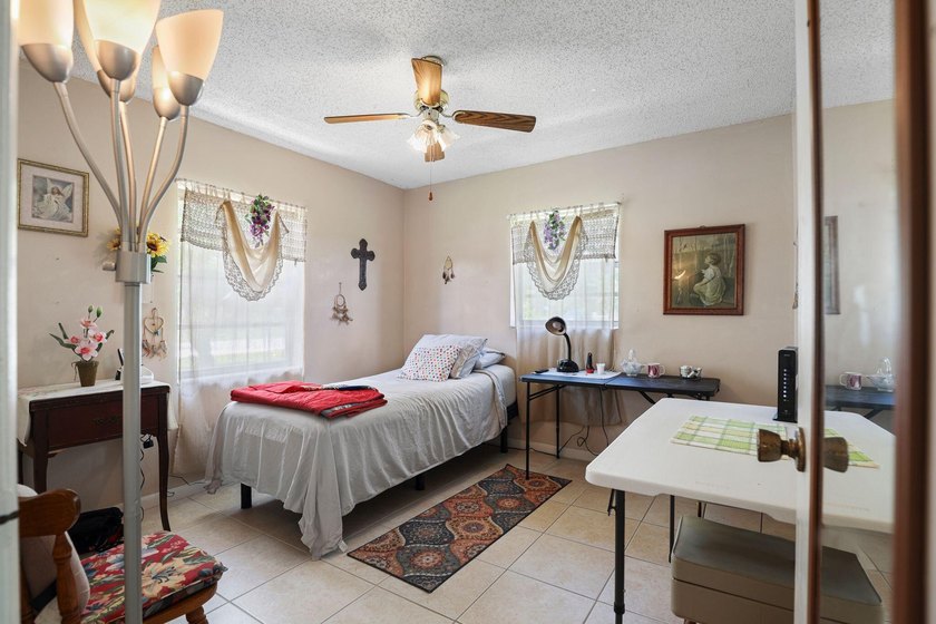 Great deal on a three bedroom pool home on a 1/2 acre. Located - photo 13