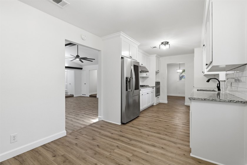 Waterfront living! Wonderfully updated move-in ready on the - photo 16