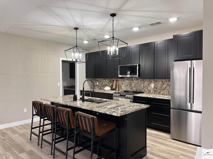 Brand New Custom Built Home with Large 36x40 Garage on Blacktop - photo 16