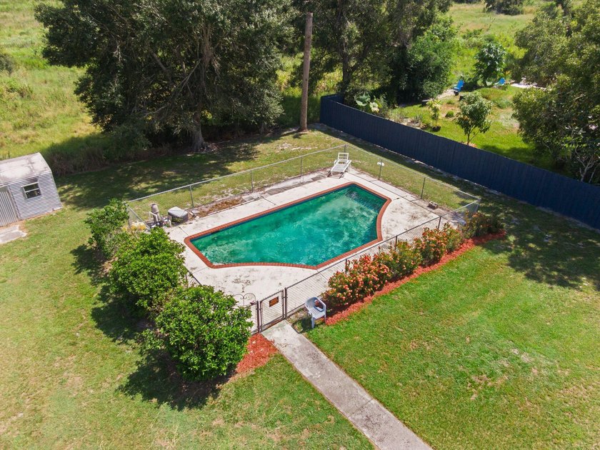 Great deal on a three bedroom pool home on a 1/2 acre. Located - photo 19