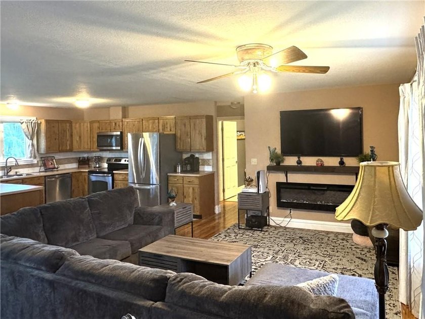 This 3 bedroom 2 bathroom ranch home is located within the gated - photo 3