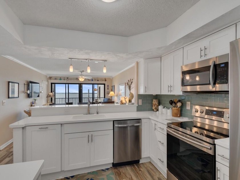 Wake up to peaceful Intracoastal views in this 2-bedroom, 2-bath - photo 5
