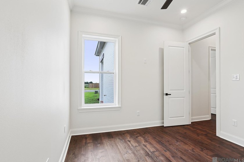 Welcome to this beautifully designed 4-bedroom, 3-bath home in - photo 12