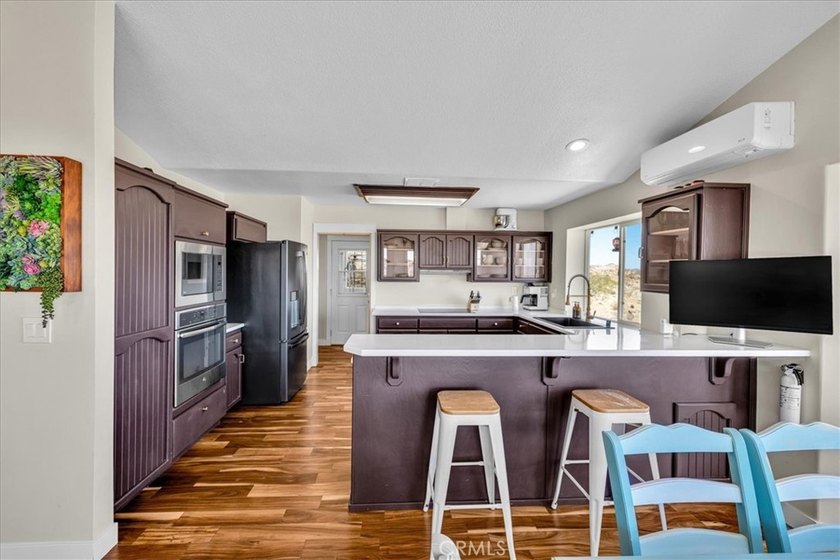 Welcome to the pinnacle of desert living - a custom-designed - photo 13