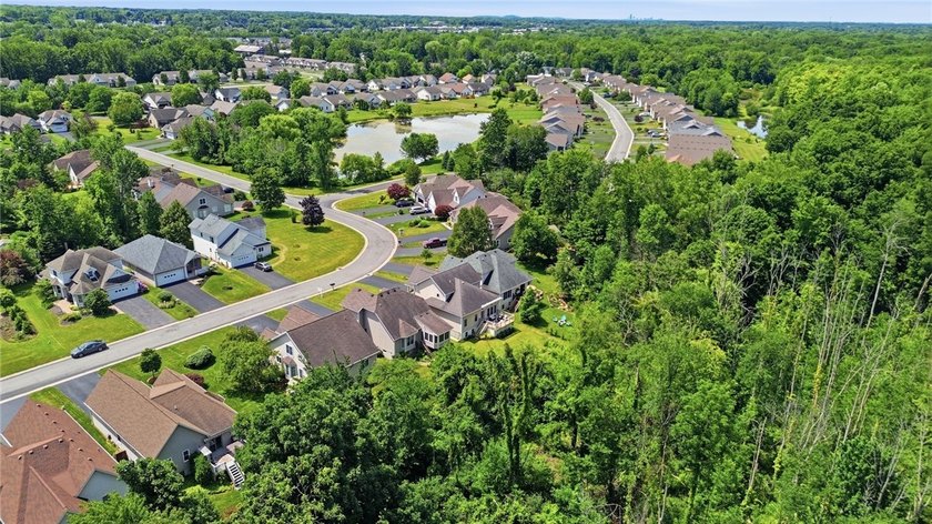 Welcome to 770 Bel Arbor Trail, where refined first-floor living - photo 45