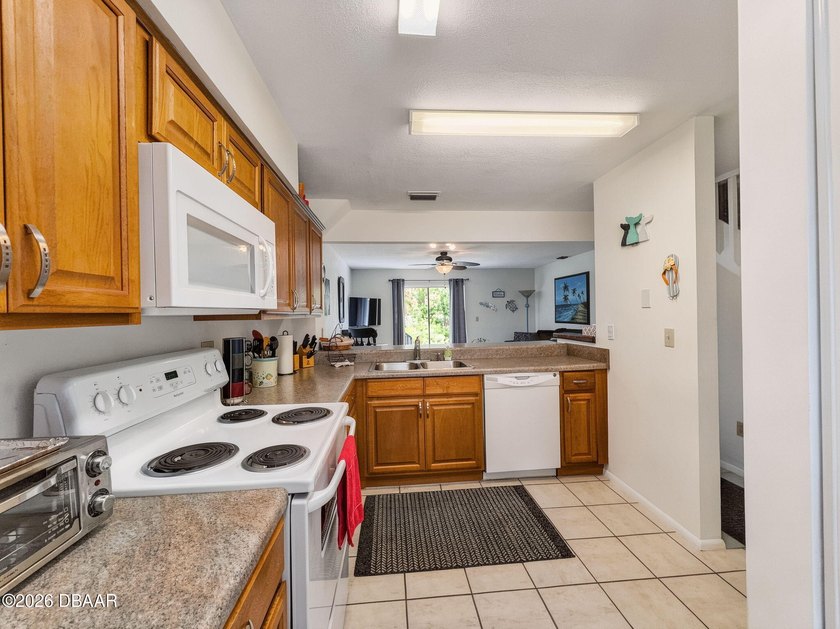 Discover comfortable and low-maintenance living in this - photo 8
