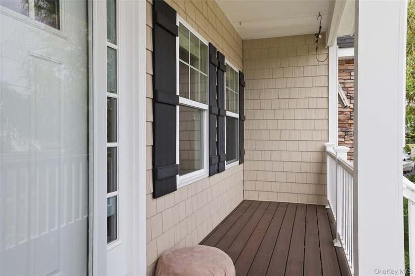 Welcome to 34 Meadow Lane in Amityville. This expansive - photo 3