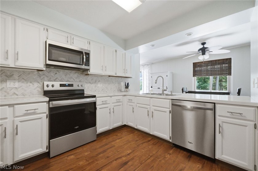 Welcome home to this beautifully updated 3-bedroom, 2 full-bath - photo 3