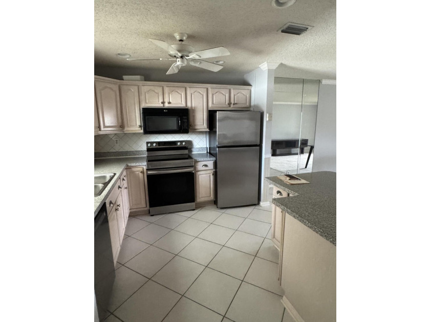 Welcome to the Twin Lakes South Condos in Stuart. This active - photo 11
