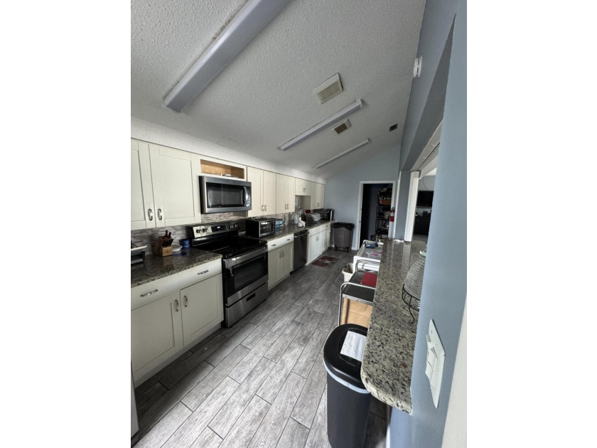 Welcome to the Twin Lakes South Condos in Stuart. This active - photo 14