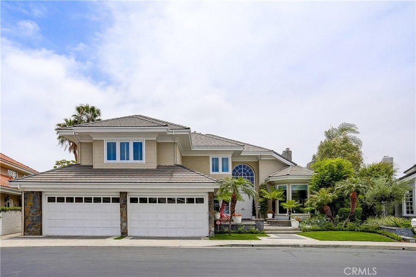 Nestled within the prestigious guard-gated community of Belcourt - photo 2