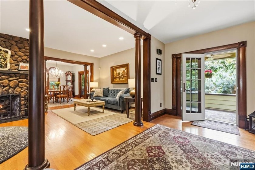 This home is gracefully positioned on a beautifully landscaped - photo 10