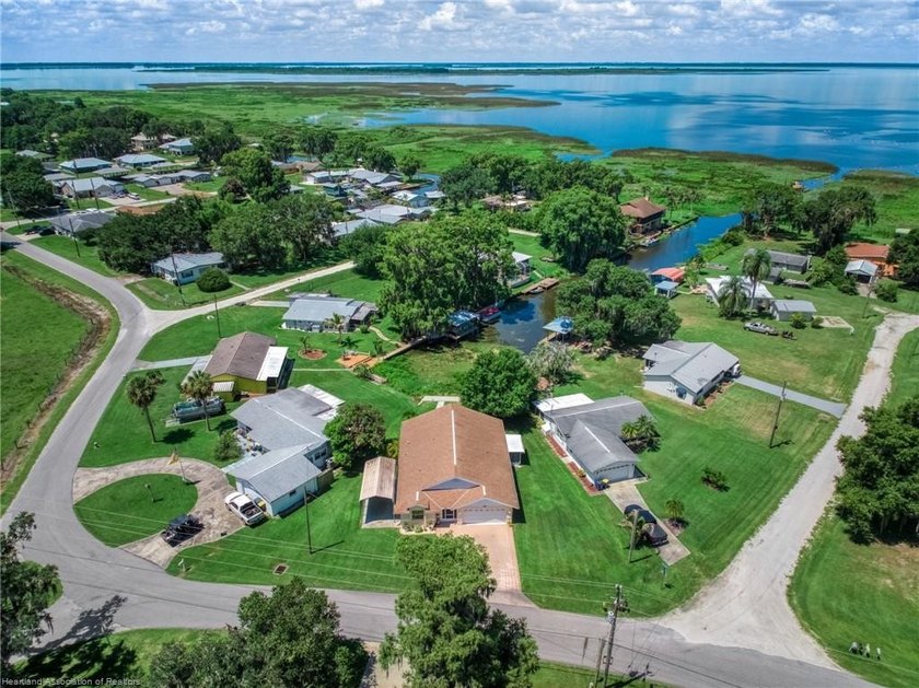 Immaculate Waterfront Living with Direct Lake Access! Nestled on - photo 9