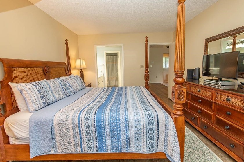 This stunning two-bedroom, two-bath, second floor villa offers - photo 30