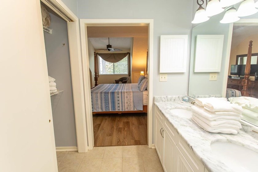 This stunning two-bedroom, two-bath, second floor villa offers - photo 34