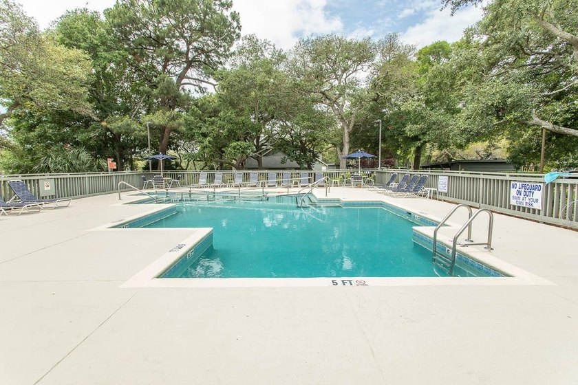 This stunning two-bedroom, two-bath, second floor villa offers - photo 44