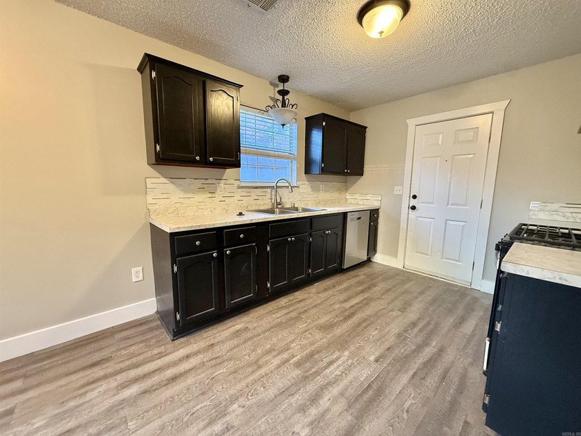 This beautiful home was remodeled in 2023. It features - photo 8