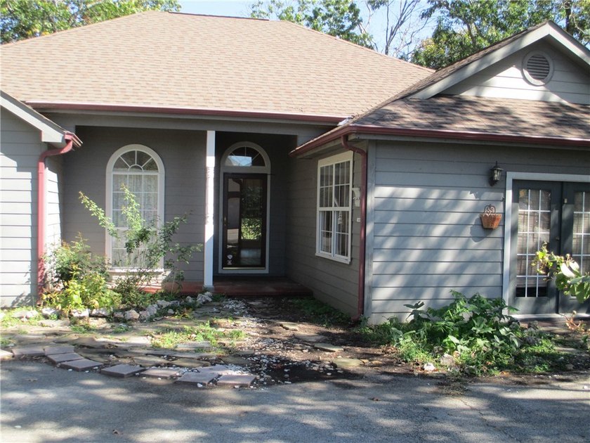 Custom built one owner home awaits your special touch. Upon - photo 2