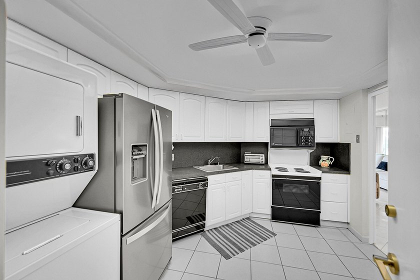 Experience the ultimate coastal lifestyle in this rarely - photo 16